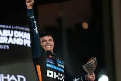 McLaren driver Lando Norris of Britain reacts after becoming a world champion after the Abu Dhabi Formula One Grand Prix in Abu Dhabi, United Arab Emirates, Sunday, Dec. 7, 2025. (AP Photo/Darko Bandic)
